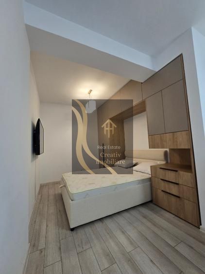 APARTAMENT TIP STUDIO 2 CAMERE MOBILIAT SI UTILAT CU GRADINA PROPRIE - Poză 2