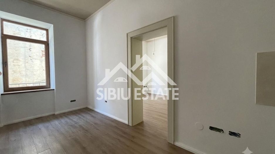 Apartament renovat, în inima Sibiului, pe strada Nicolae Bălcescu - Poză 6
