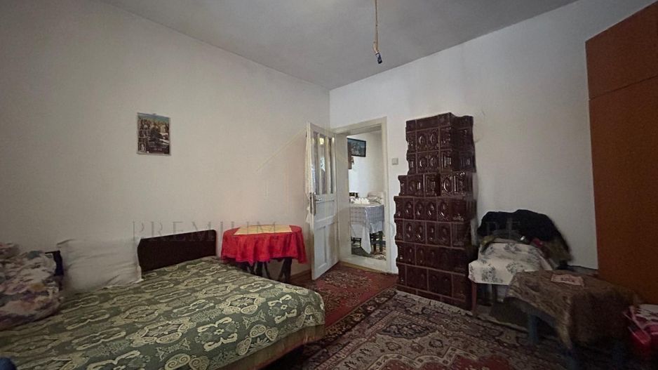 Casă batraneasca+ teren 999 mp intravilan în Oituz - Poză 14