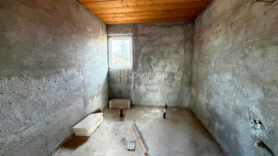 Casa unifamilială cu teren generos - Poză 10