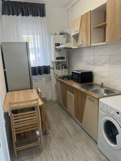 Garsoniera demisol foarte inalt centrala 26 mp - Poză 4