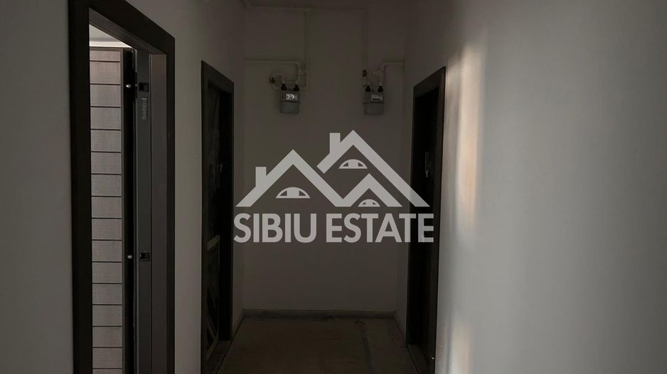 Garsoniera 41 mp, balcon bucatarie separata , intabulata zona Brana - Poză 16