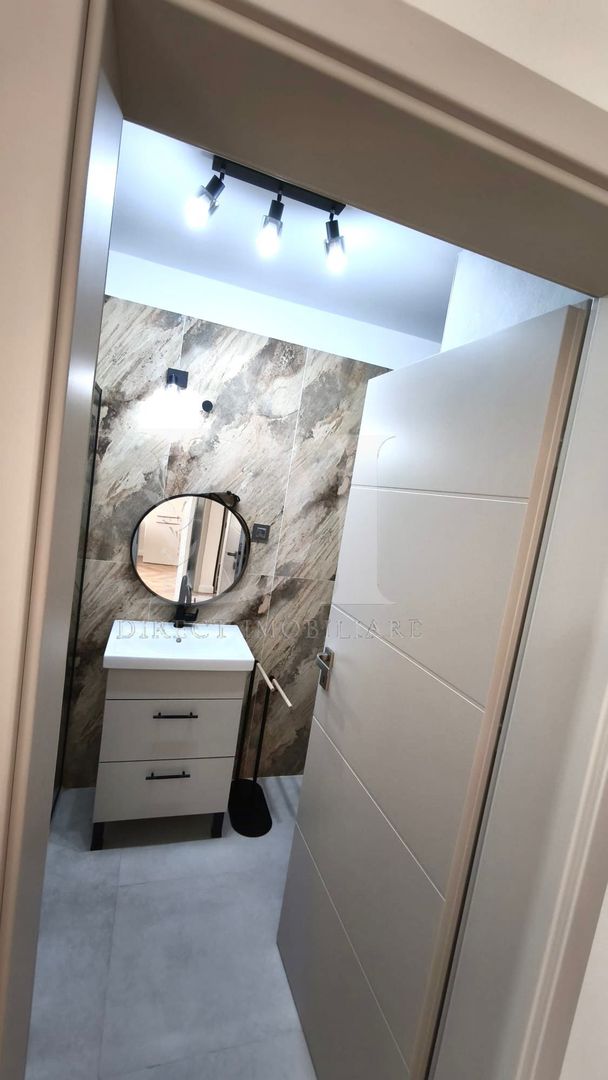 Apartament cu 2 camere -zona Eroilor Floresti - Poză 9