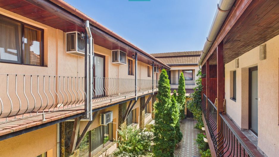 Casă și clădire de apartamente la Orțișoara - Poză 13