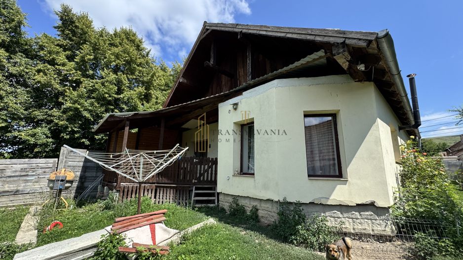Casă la țară cu teren generos în satul Ruși - Poză 6