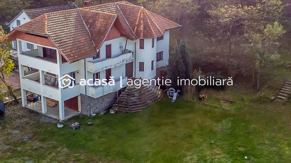 Casă în localitatea Miniș - Comision 0% la cumparare - Poză 1