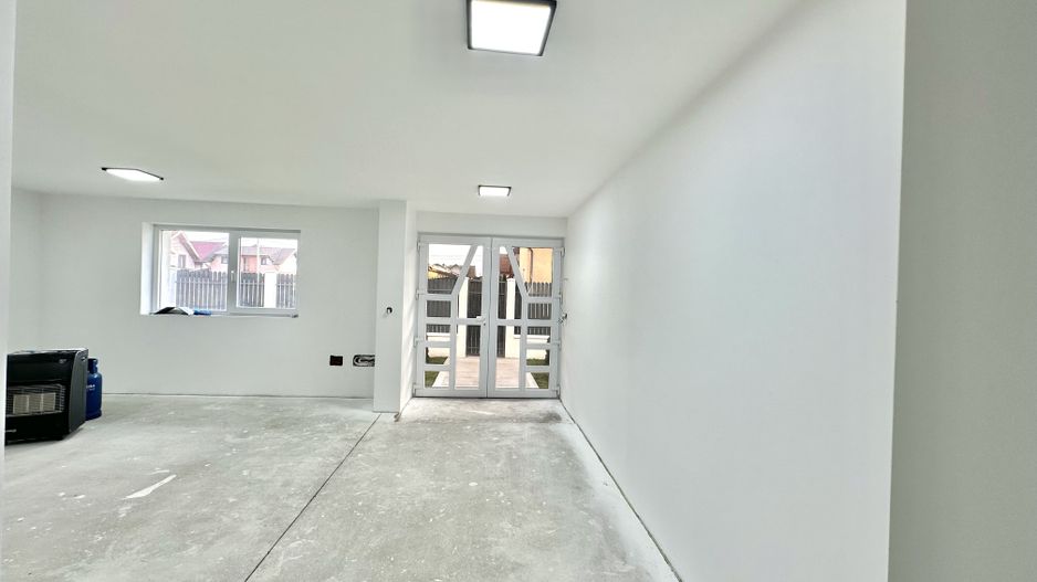 Casă individuală de vanzare  cu garaj și curte proprie – Hălchiu - Poză 4