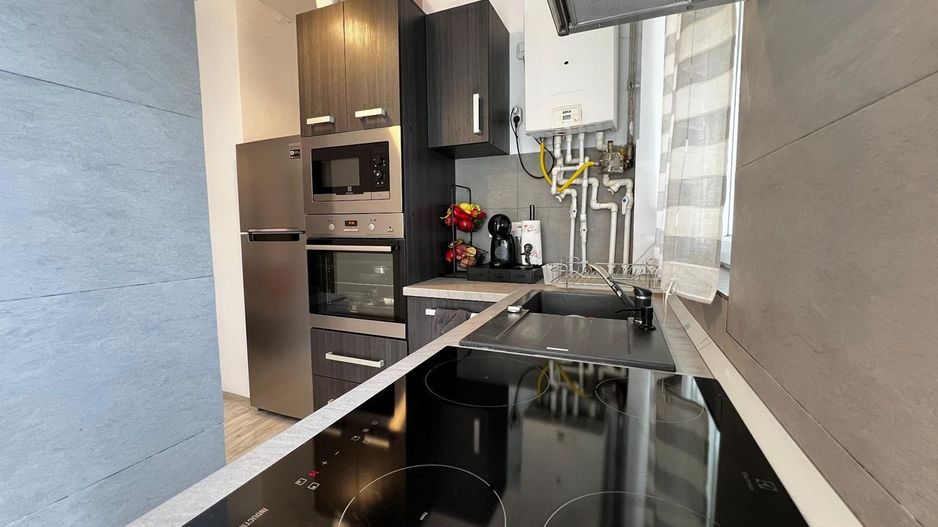 Casa cu 2 camere zona centrala - Poză 7