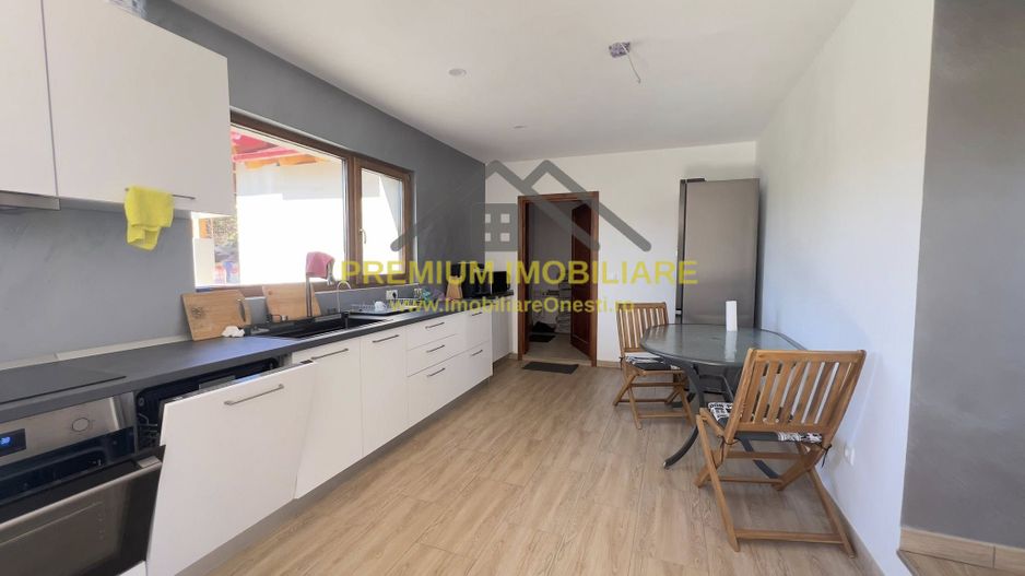 Casa de vanzare la 13 km de Onesti - Poză 5