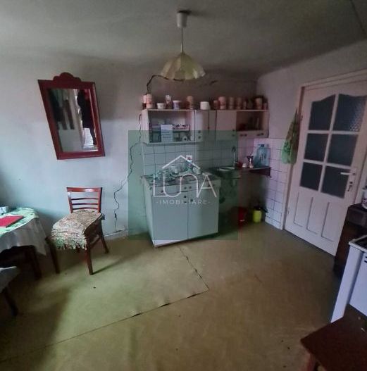 Casă cu teren de 1.000 m² – utilități complete, ideală pentru renovare - Poză 5