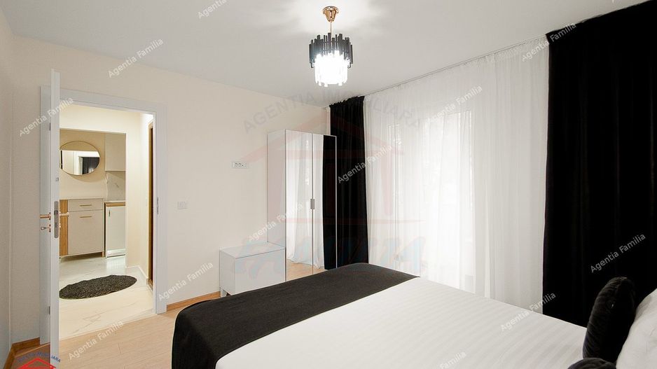 Inchiriere apartament 3 camere decomandat zona centrala - Poză 17