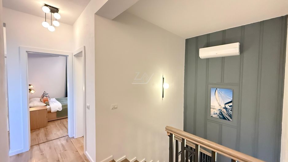 Casa moderna si cocheta. Locatie excelenta. Curte amenajata. Loc de parcare. - Poză 25