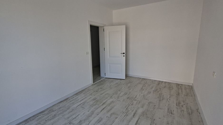 Apartament cu 3 camere si un loc de parcare - Poză 11