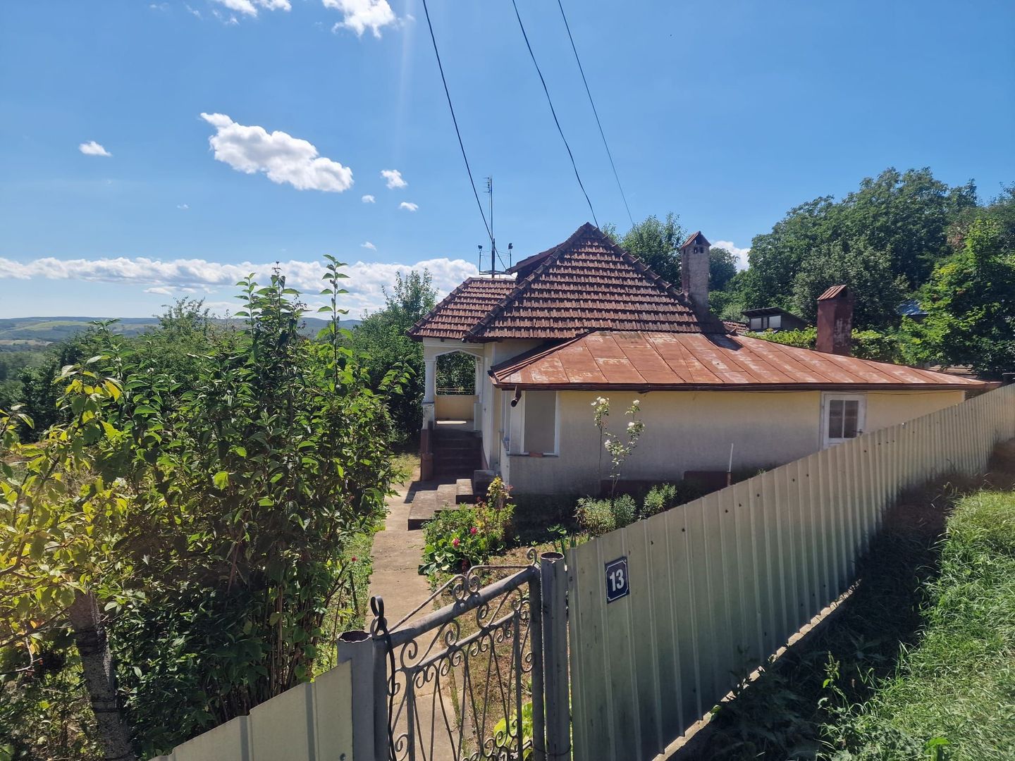 Casa in mediu rural cu teren - Poză 6