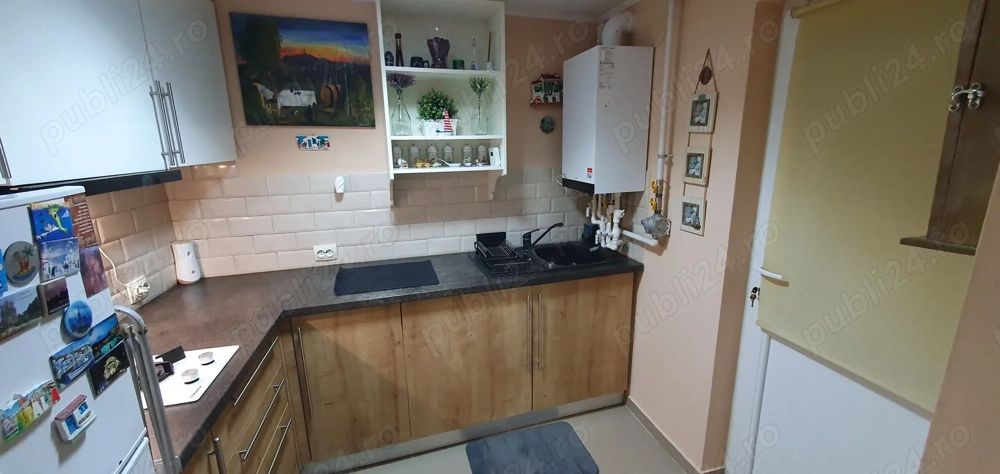 Închiriez garsonieră la casă,  Unirii, centrală proprie - Poză 3