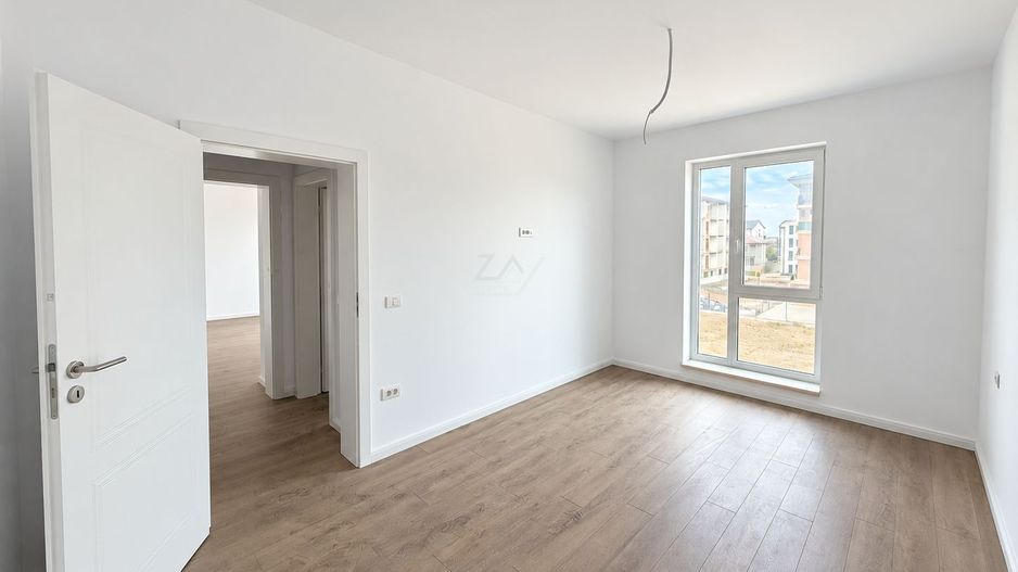 Apartament nou cu bucatarie inchisa. Clima. Langa magazin si transport in comun. - Poză 7