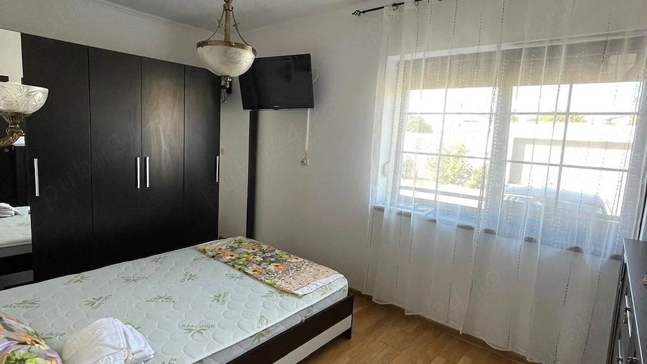 Apartament cu 2 camere, curte și loc de parcare - Poză 10