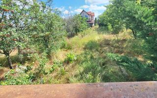 Casă de 200 mp cu teren generos de 1.600 mp - Poză 4
