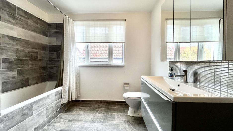 Casă luminoasă cu curte și garaj, perfectă pentru familie | Braytim - Poză 24