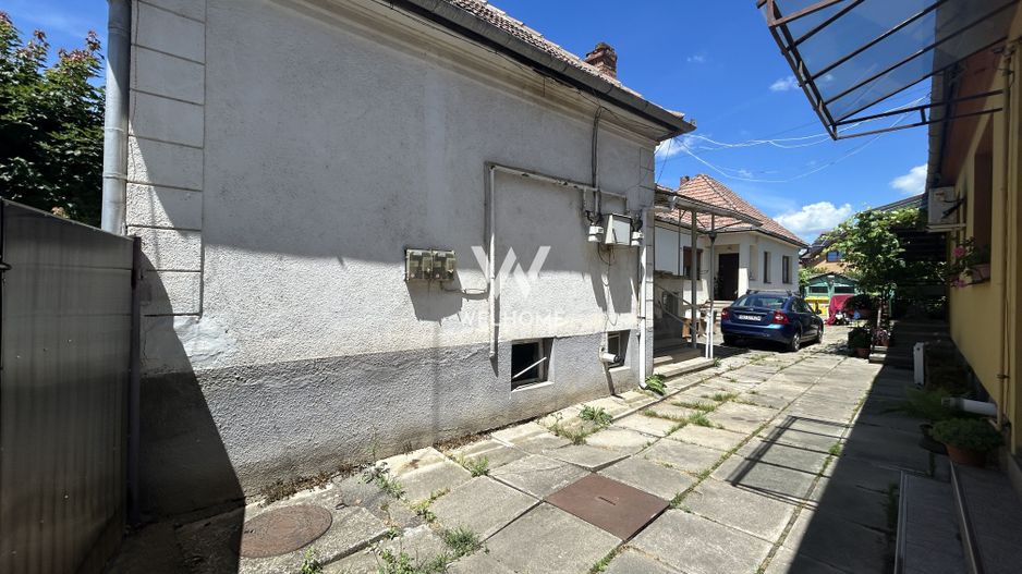Casa in Piata Cluj, P+Demisol, curte comuna - Poză 8