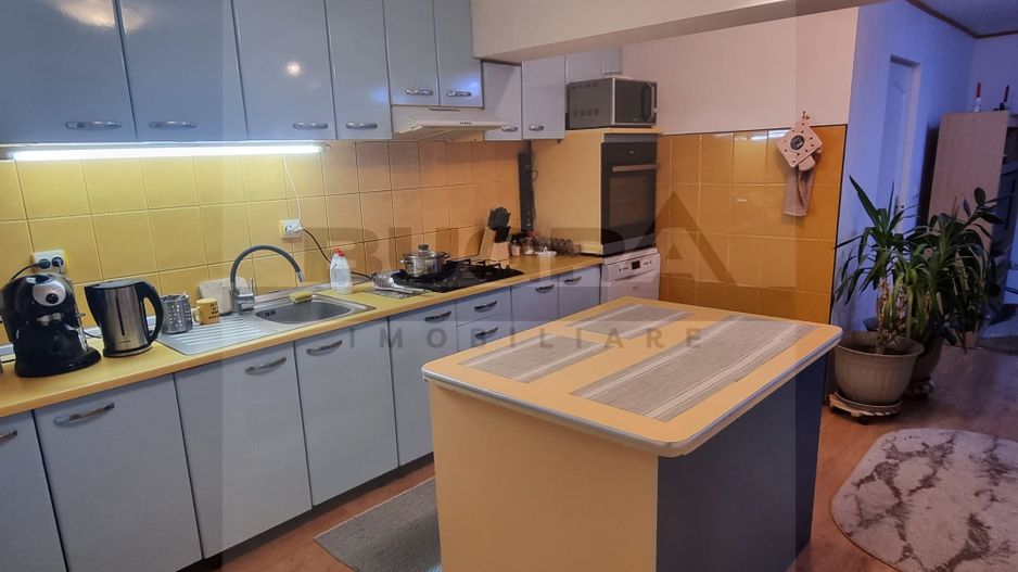 Casă spațioasă cu teren generos de 1000 mp in Dambul Rotund - Poză 4