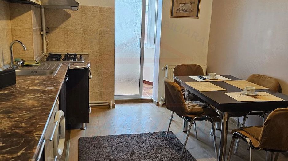 De închiriat apartament 2 camere decomandat -- Baia Comunală - Poză 1