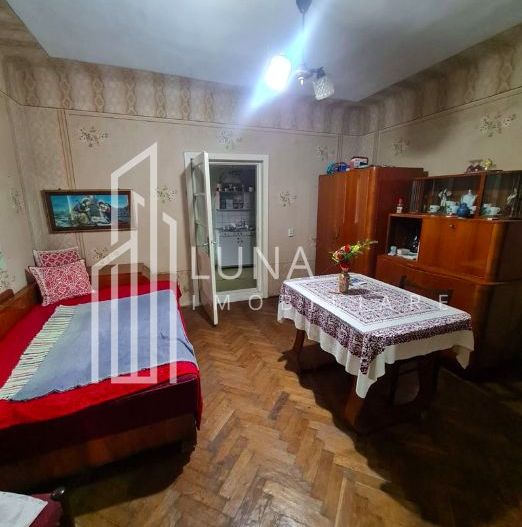 Casă cu teren de 1.000 m² – utilități complete, ideală pentru renovare - Poză 4