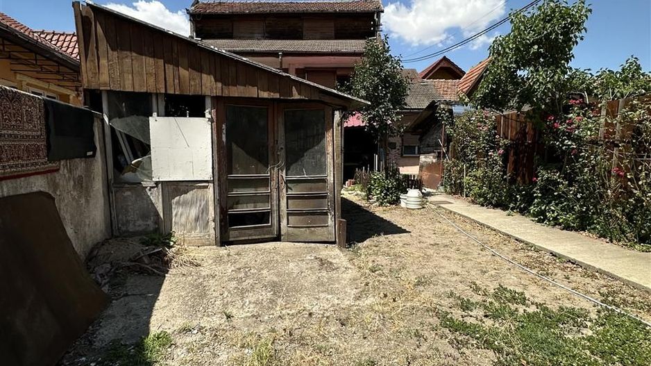 Casa individuala cu teren de 412 Piata Tineretului - Poză 7