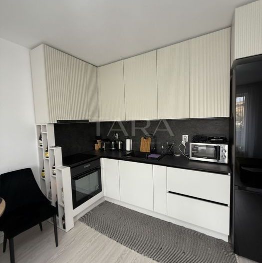 Apartament cu 2 camere, ultarfinisat, mobilat, cu grădină proprie. - Poză 3