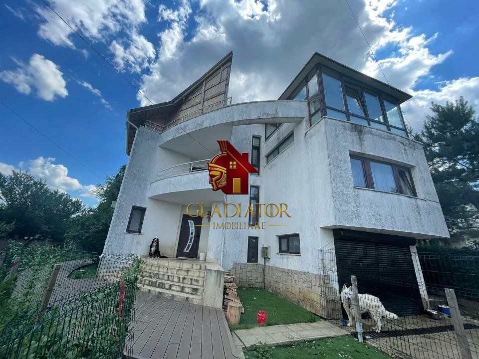 Vila cu terase, garaj si o gradina de vis pentru o familie fericita - Poză 1