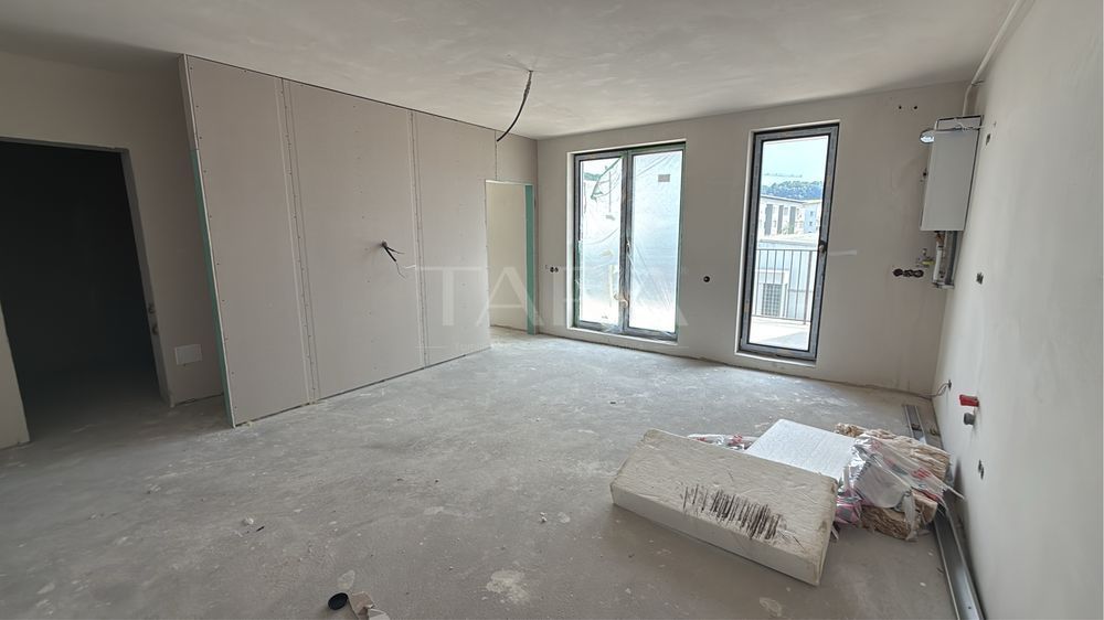 Apartament cu 2 camere, semifinisat, parcare subterană inclusă. - Poză 1