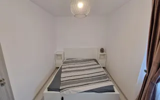 Apartament 2 camere de închiriat în Alexandru cel Bun, renovat integral și mobilat modern - Poză 13
