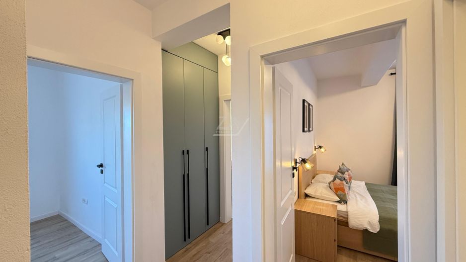 Casa moderna si cocheta. Locatie excelenta. Curte amenajata. Loc de parcare. - Poză 24