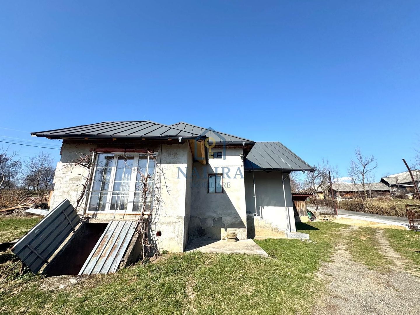 Casa de caramida de vanzare Surdesti cu teren intravilan 5000mp - Poză 17