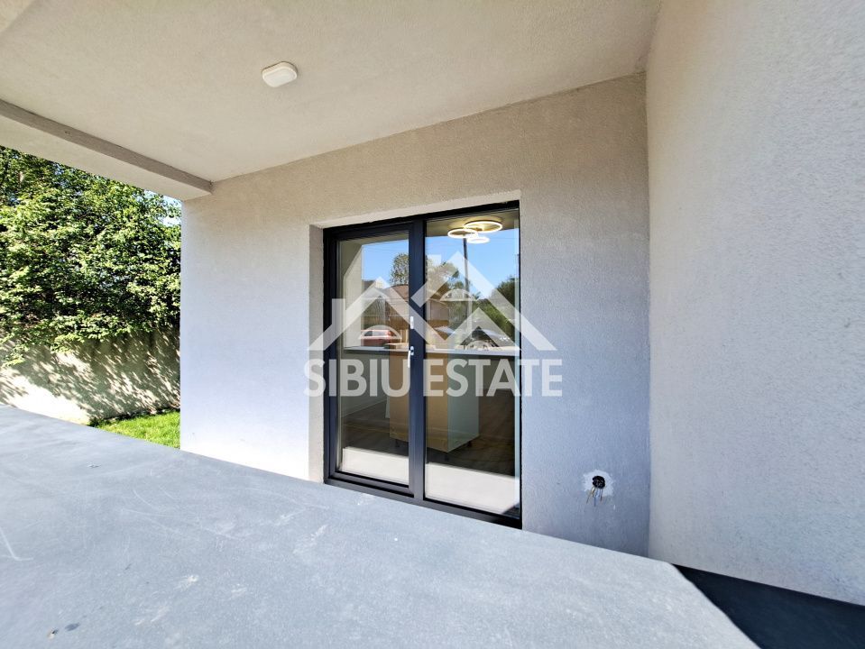 Apartament la cheie cu gradina Selimbar - Poză 7