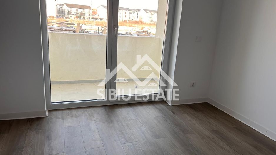 Garsoniera 41 mp, balcon bucatarie separata , intabulata zona Brana - Poză 20