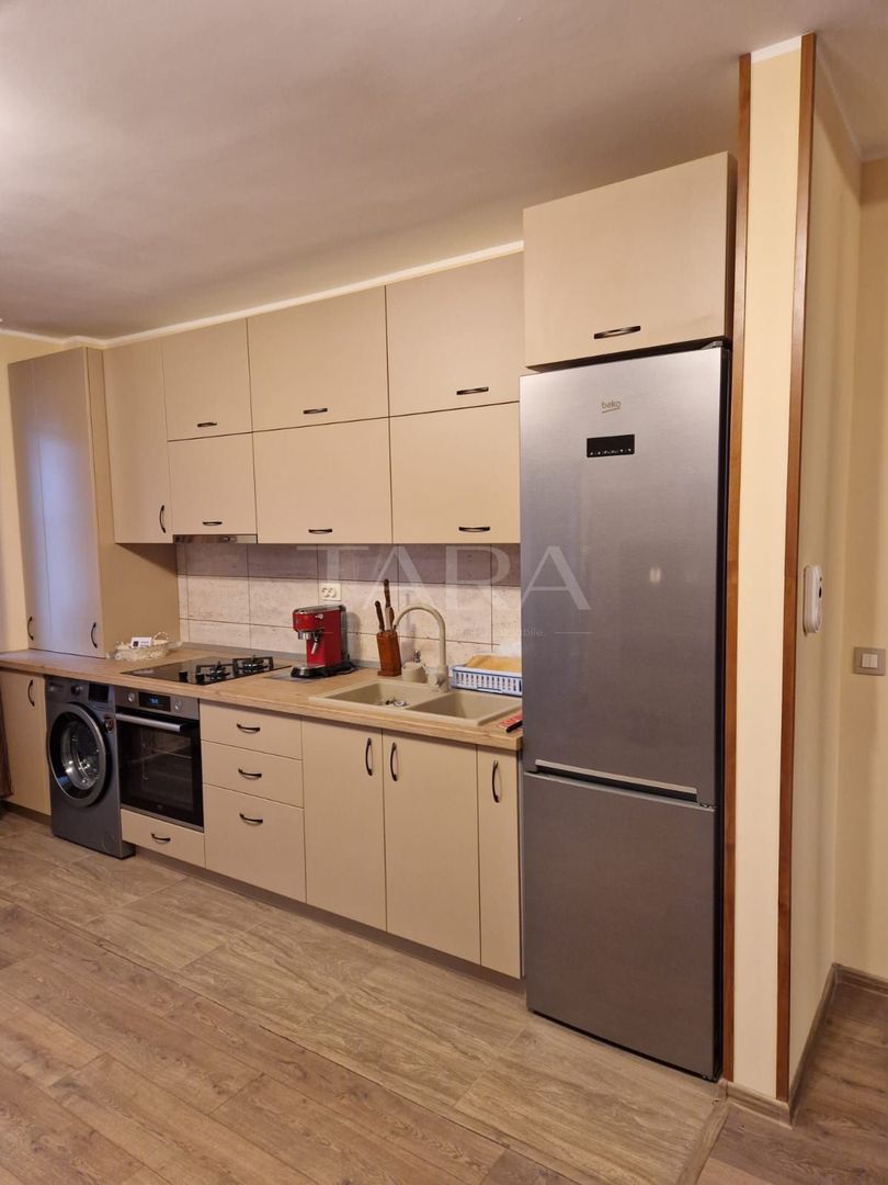 Locuință modernă, cu terasă de 40 mp și parcare. - Poză 1