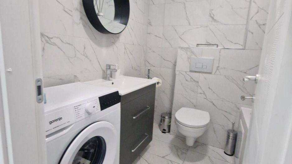 Garsonieră modernă cu grădină proprie în Cosmopolis – investitie - Poză 8