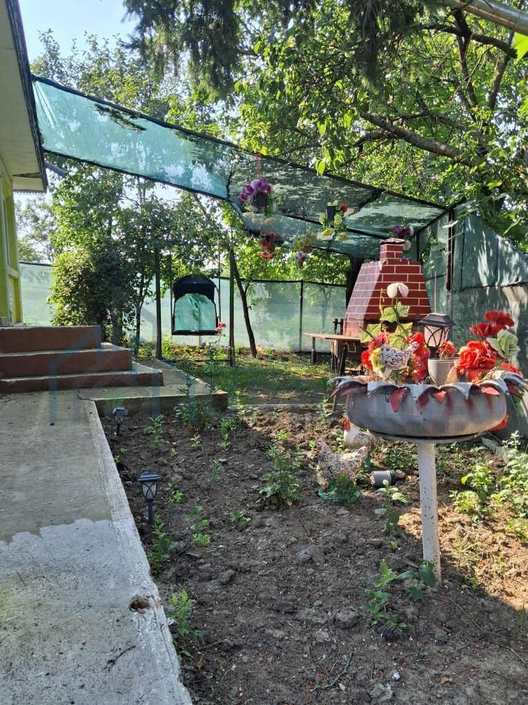 Proprietate de vânzare cu casă și teren în Hoisești, comuna Dumești - Poză 1
