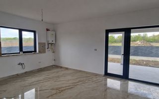 Casa plan parter 3 camere 70 mp/teren 400 mp Ciurbesti 149000 euro - Poză 4