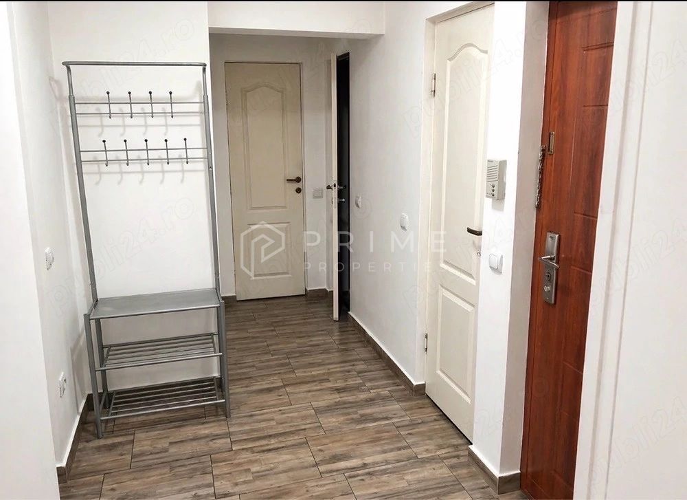 Apartament cu 2 camere, parter înalt - Poză 2