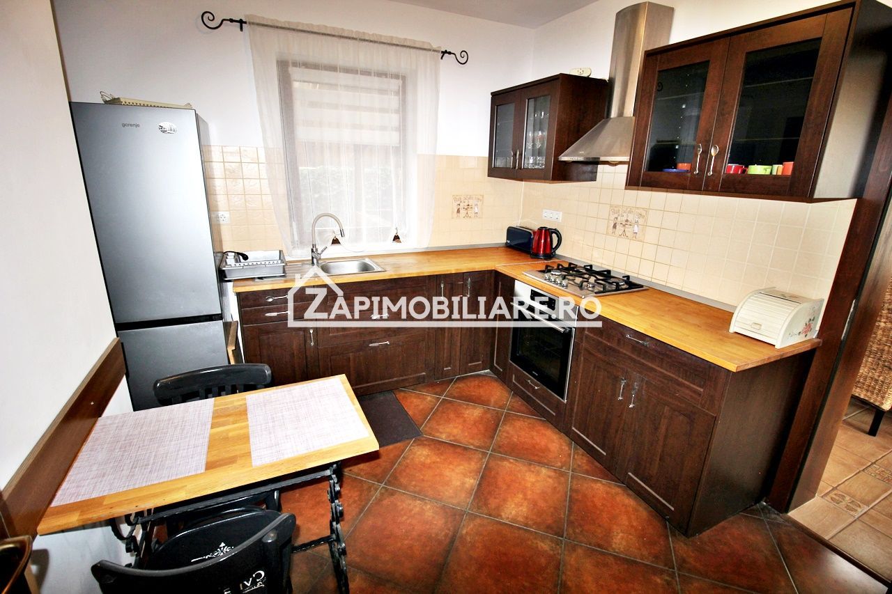 Casa 3 camere, 2 bai,1 garaj,teren 360 mp.zona Dambu Pietros - Poză 6