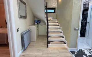 Casa P+1+M cu teren de 650 mp, piscina si curte complet amenajata - Poză 21