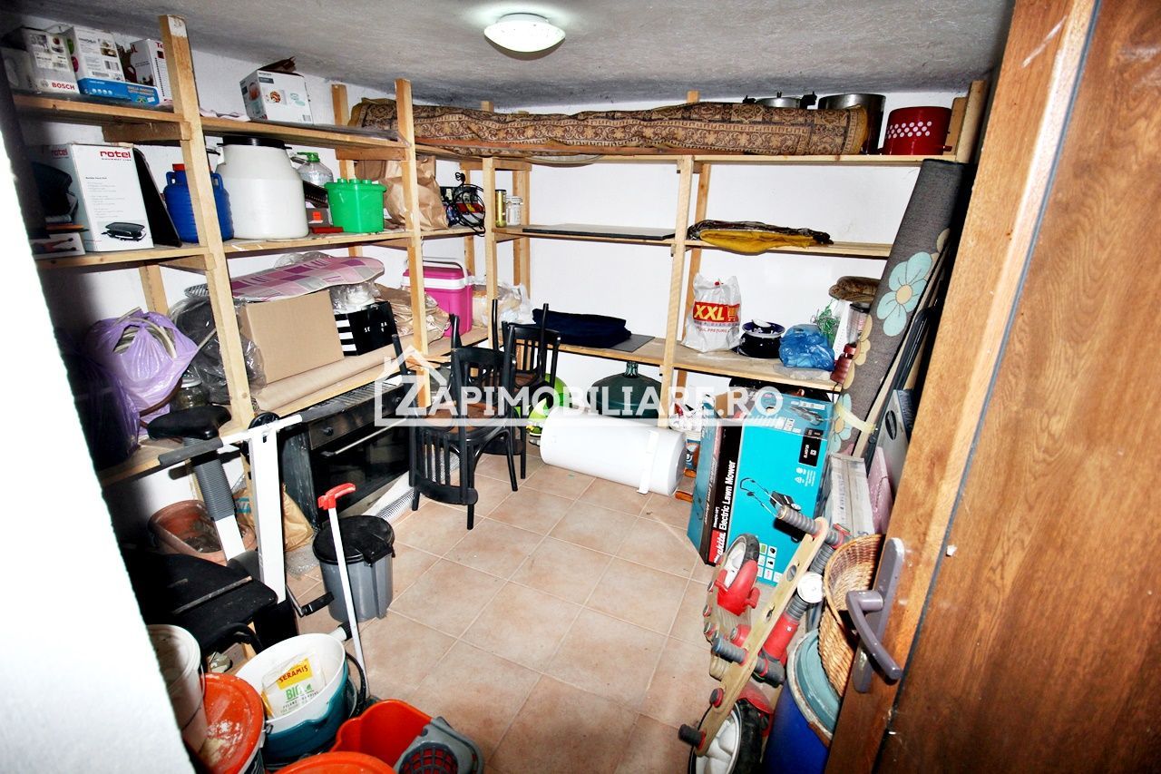 Casa 3 camere, 2 bai,1 garaj,teren 360 mp.zona Dambu Pietros - Poză 16