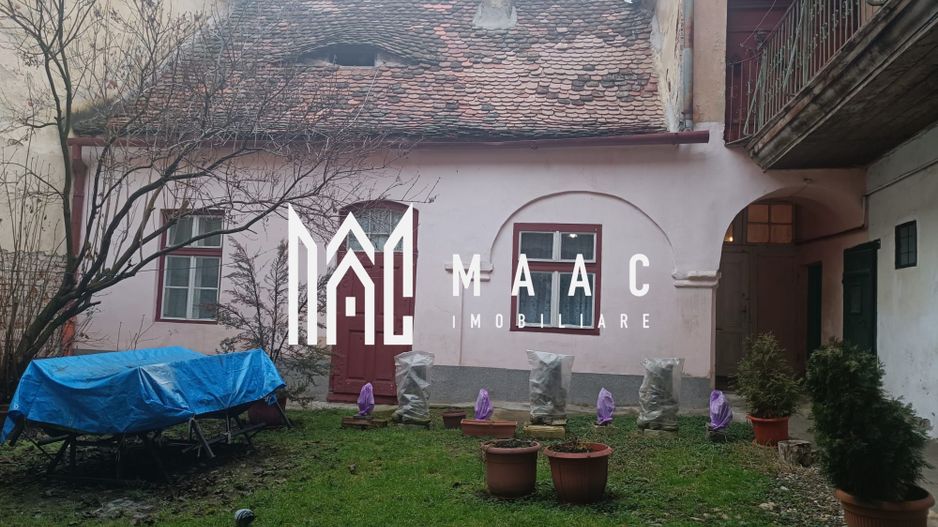 Casa | 40 MPU | Curte comuna | Zona Centrala - Poză 1