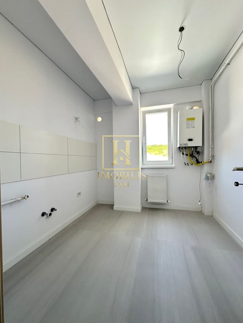 Apartament 1 camera decomandat 40 mp Bucium 66300 euro - Poză 2