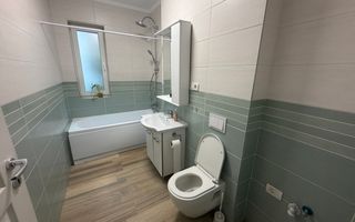 Bucatarie inchisa. Curte proprie. Cu 2 bai - Poză 11