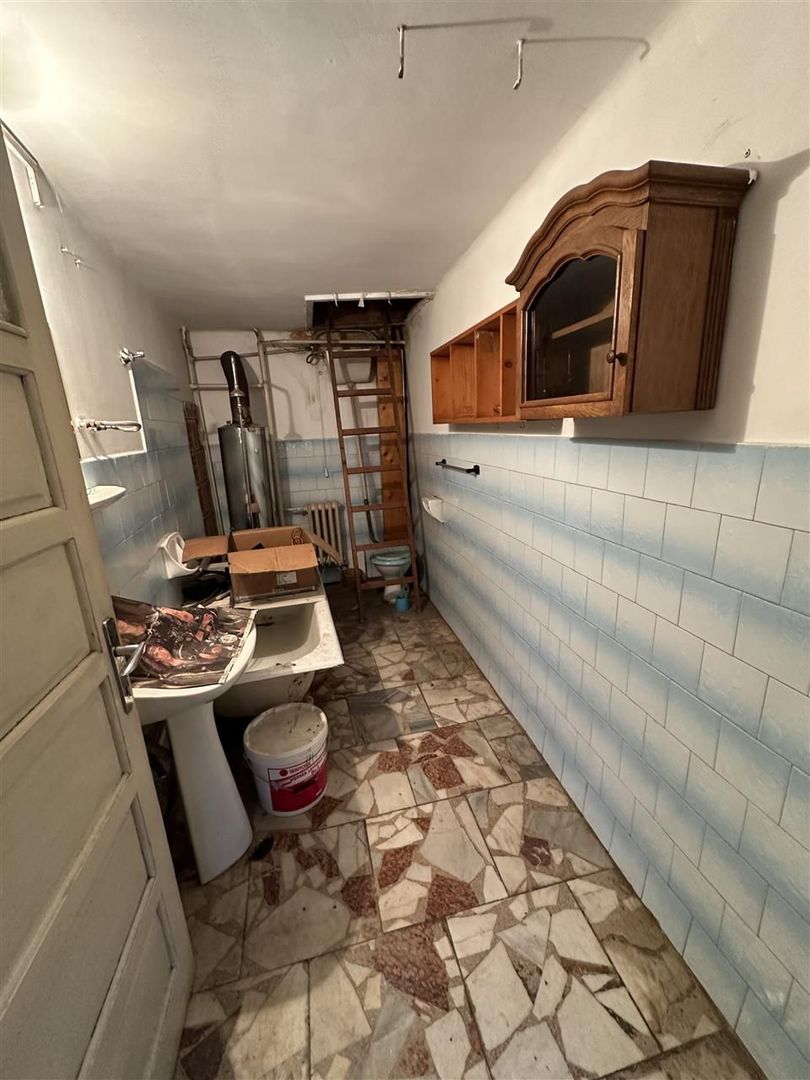 Casa individuala cu teren de 412 Piata Tineretului - Poză 9