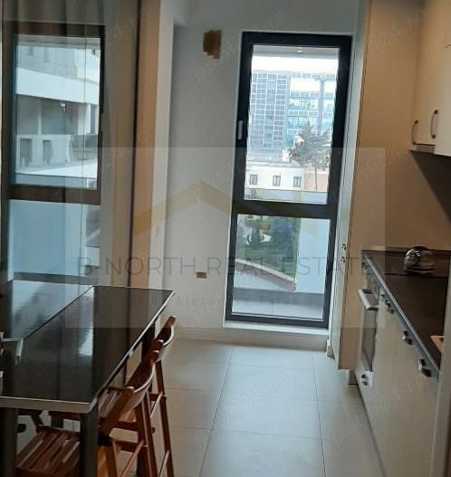Apartament de închiriat 2 camere Nusco City Pipera | Vedere către grădina - Poză 6