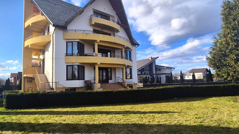 Apartament la casă cu grădină - Poză 2